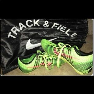 Brand new neon green Nike track spikes. Size 5